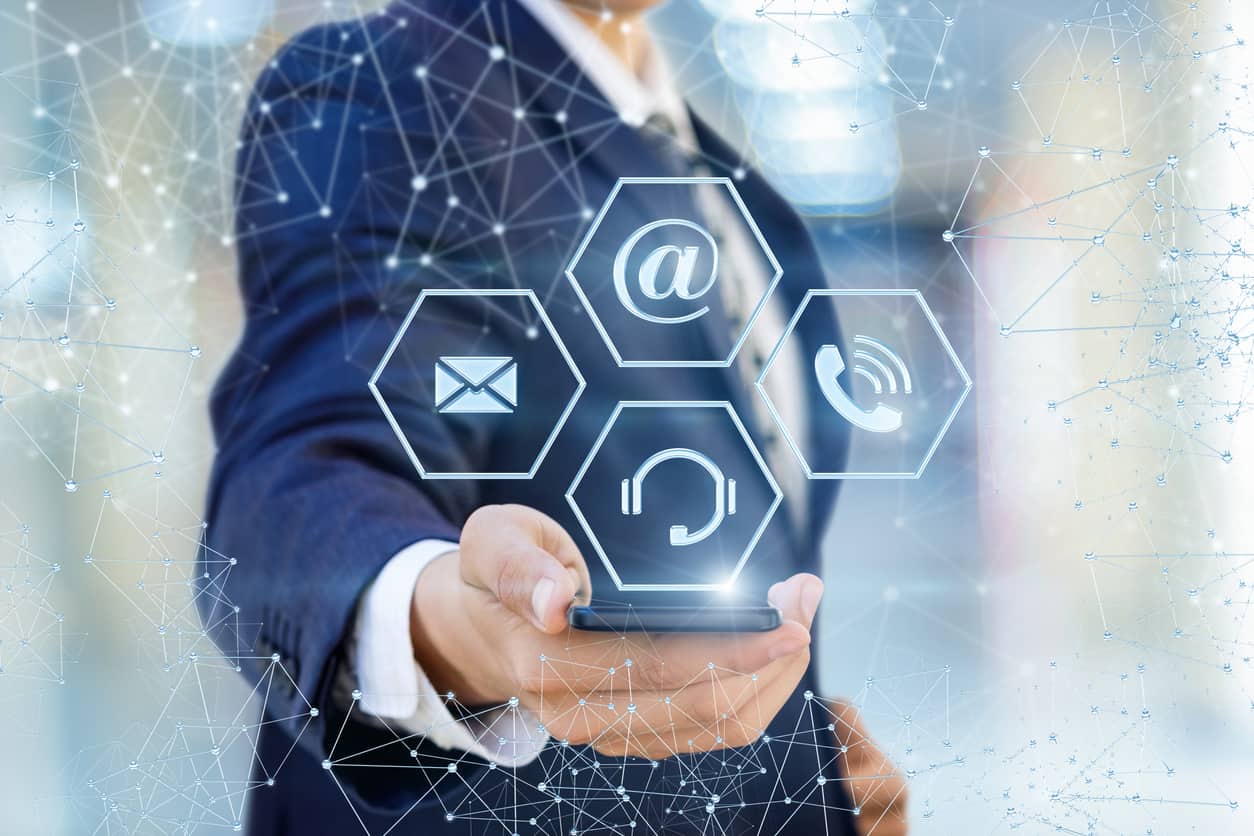 businessman showing icons contact us in phone .